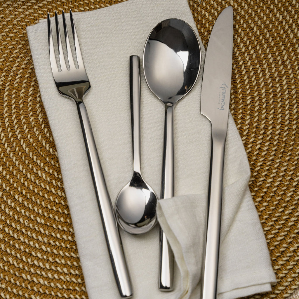 24 Piece Cutlery Set for 6 People Chopstick 24BXCHP-IGLC Grunwerg Modern Chopstick handle cutlery set on a napkin