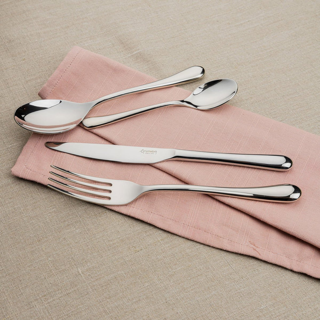24 Piece Cutlery Set for 6 People Gliss 24BXGLS-IGLC Grunwerg Traditional 18/10 Stainless steel cutlery set on a pink napkin