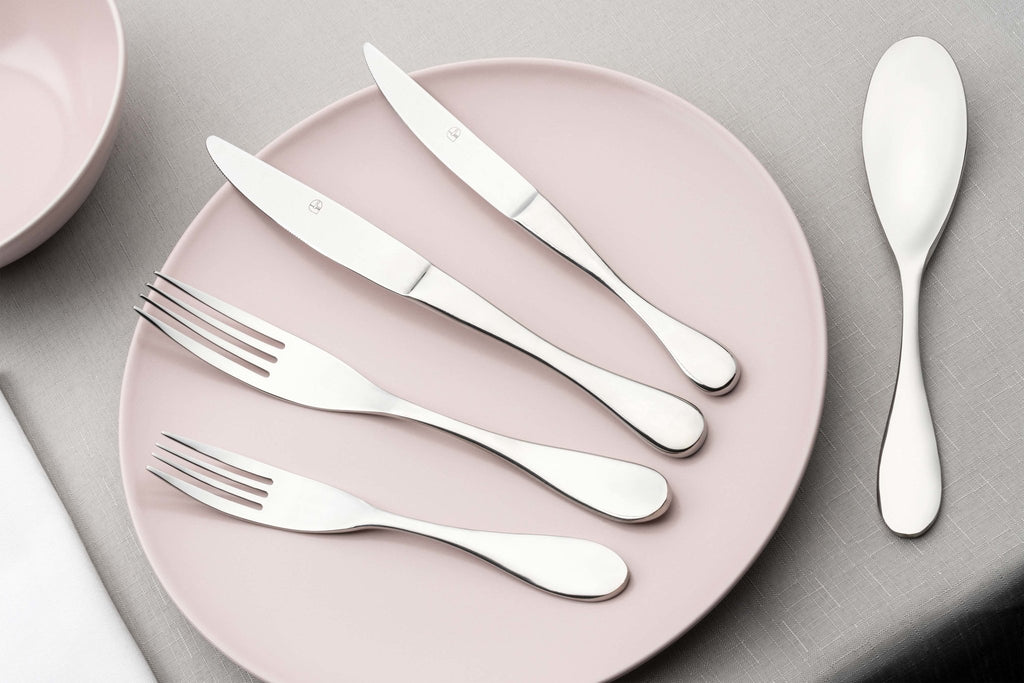 24 Piece Cutlery Set for 6 People Banquet 24BXBNQ-IGLC Grunwerg premium Stainless steel cutlery set on a pink plate